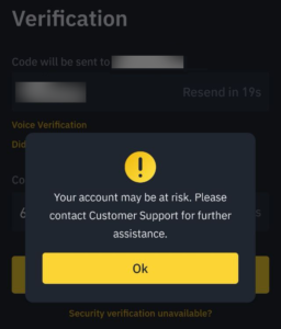 Screenshot Binance-Dialog: "Your account may be at risk. Please contact Customer Support for further assistance."